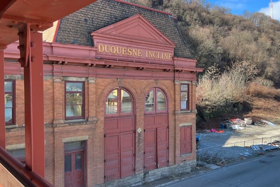 Duquesne Incline Building. It is red brick with red doors and windows