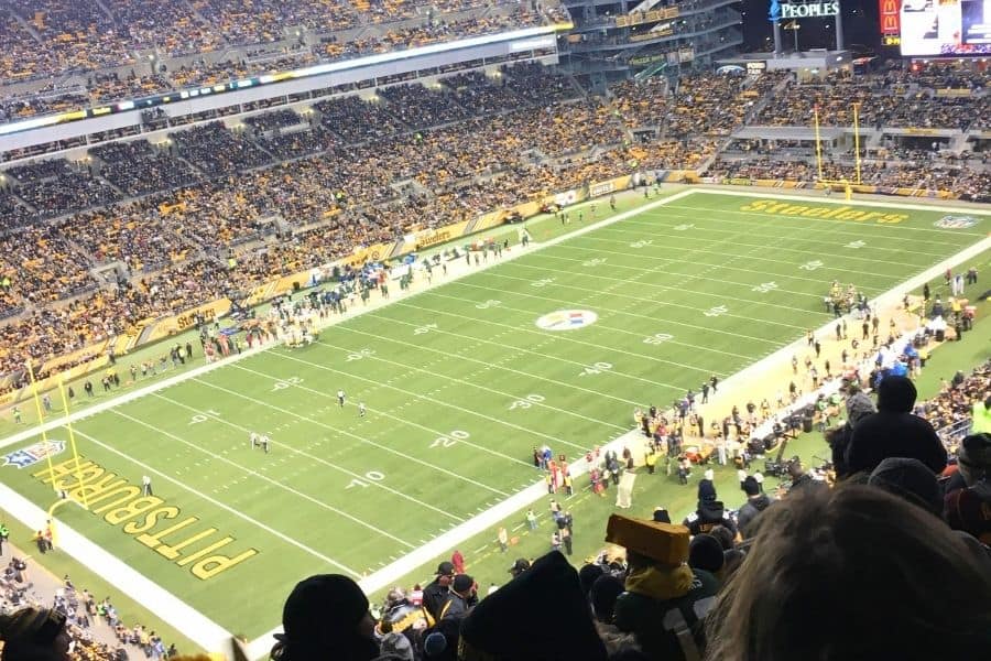 Pittsburgh Steelers Acrisure Stadium. Shows the football field and the stands filled with patrons